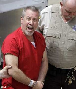 Drew Peterson trial will beging next week. Drew is pictured in prison garb while awaiting trial.